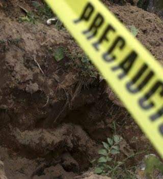 Descubren fosa clandestina con restos humanos en San Lorenzo