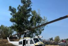 Helicóptero con helibalde atiende incendio forestal en Pátzcuaro